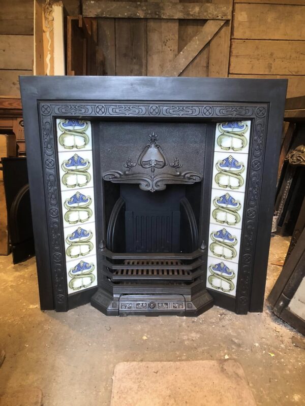 Antique Art Nouveau cast iron fireplace insert